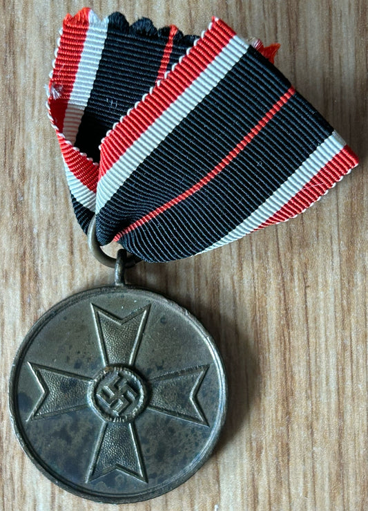 War merit medal with ribbon