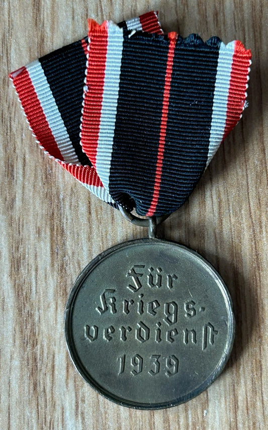 War merit medal with ribbon