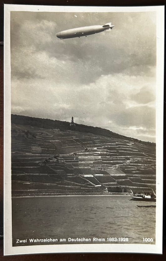 Zeppelin flying over the Rhine river photo postcard