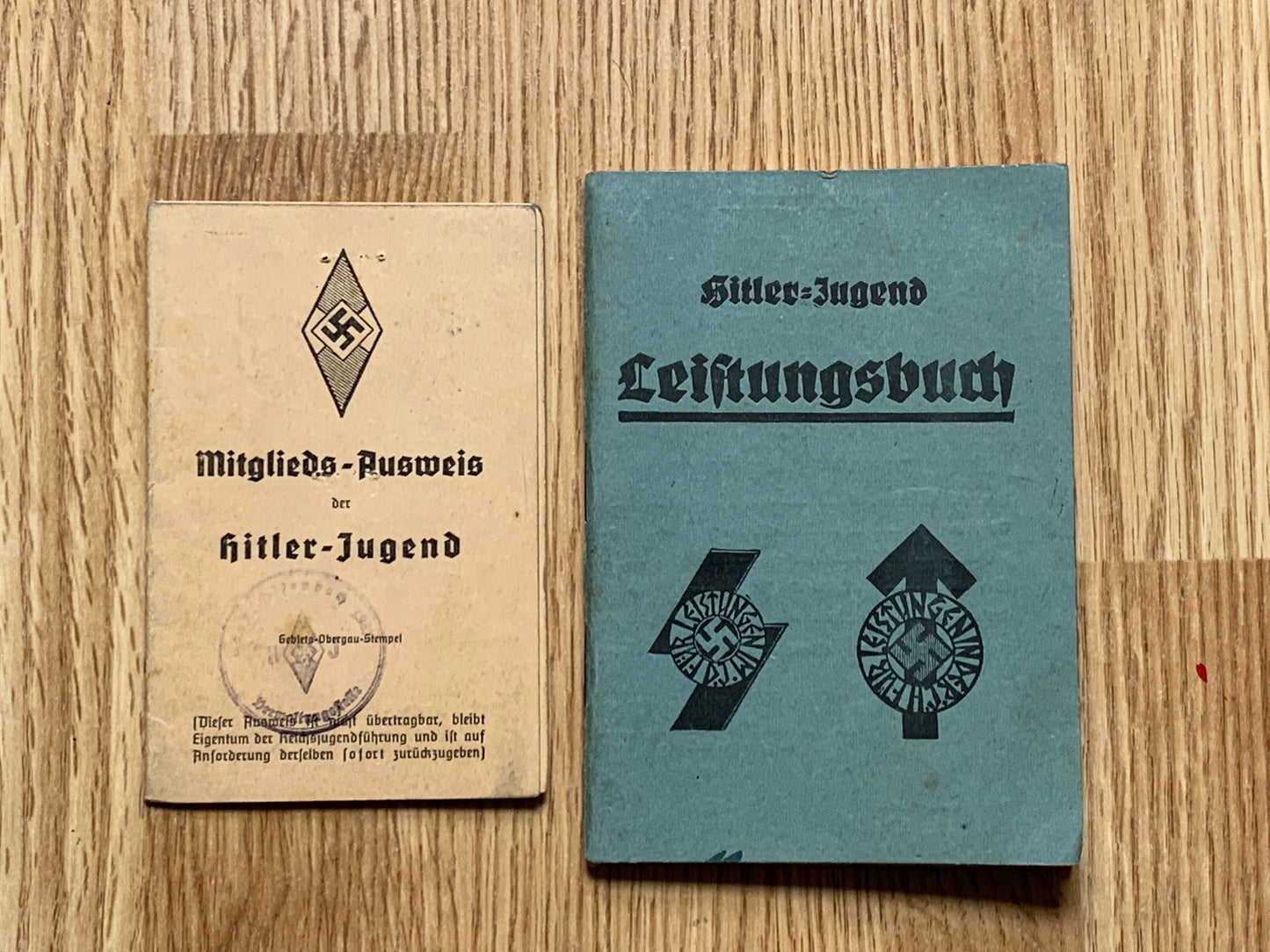 HJ membership pass and awards book, same person