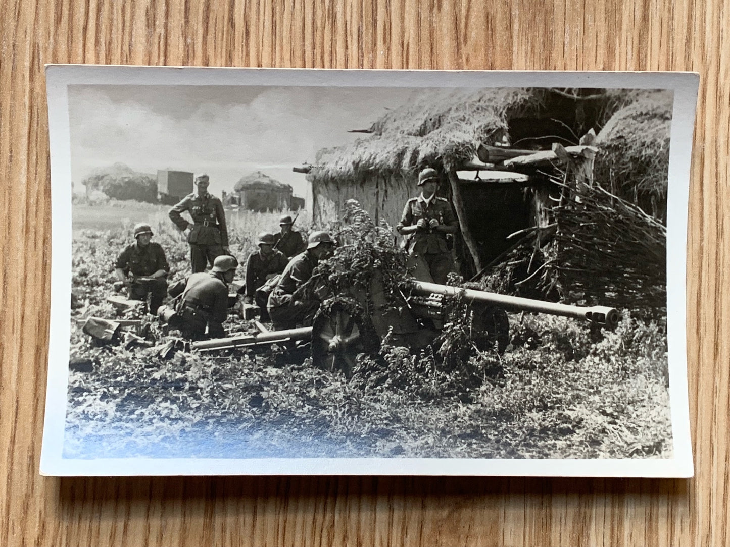 Panzerjager setting up their anti-tank gun - photo postcard