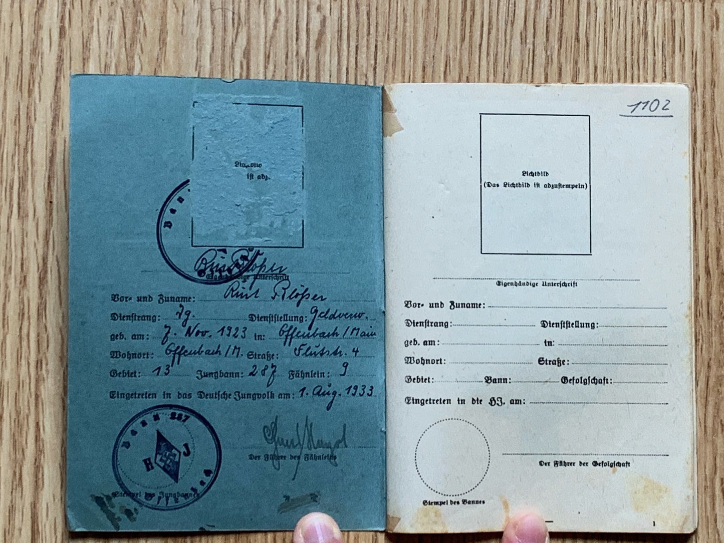 HJ membership pass and awards book, same person