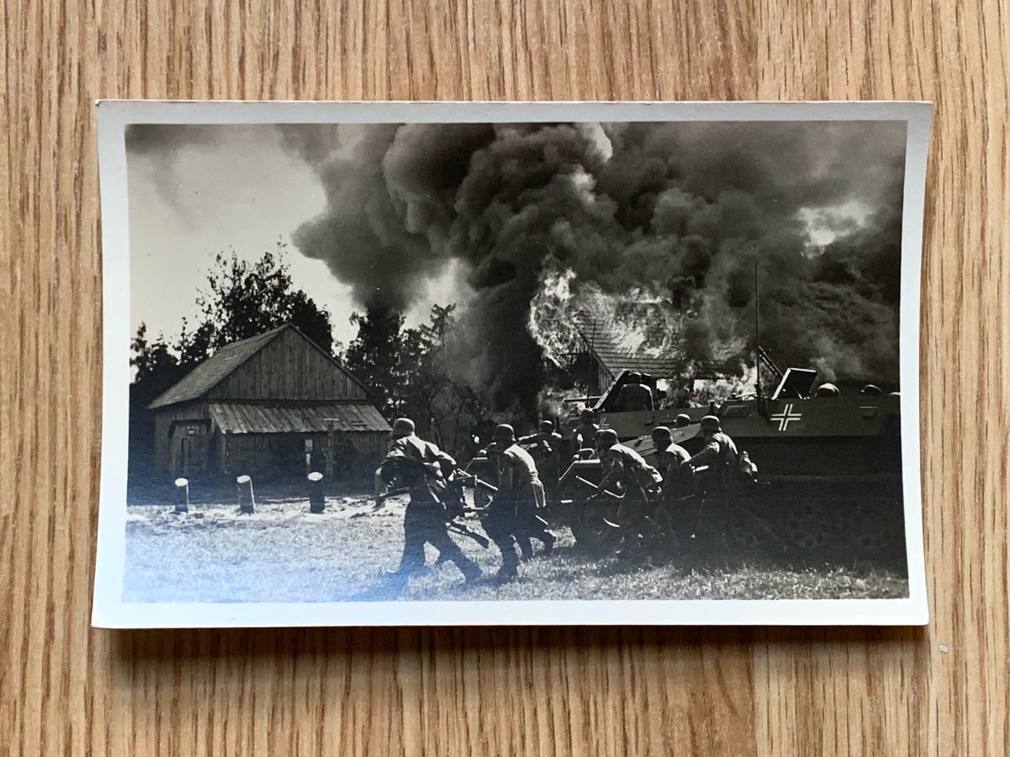 Panzergrenadiers storming a village - photo postcard