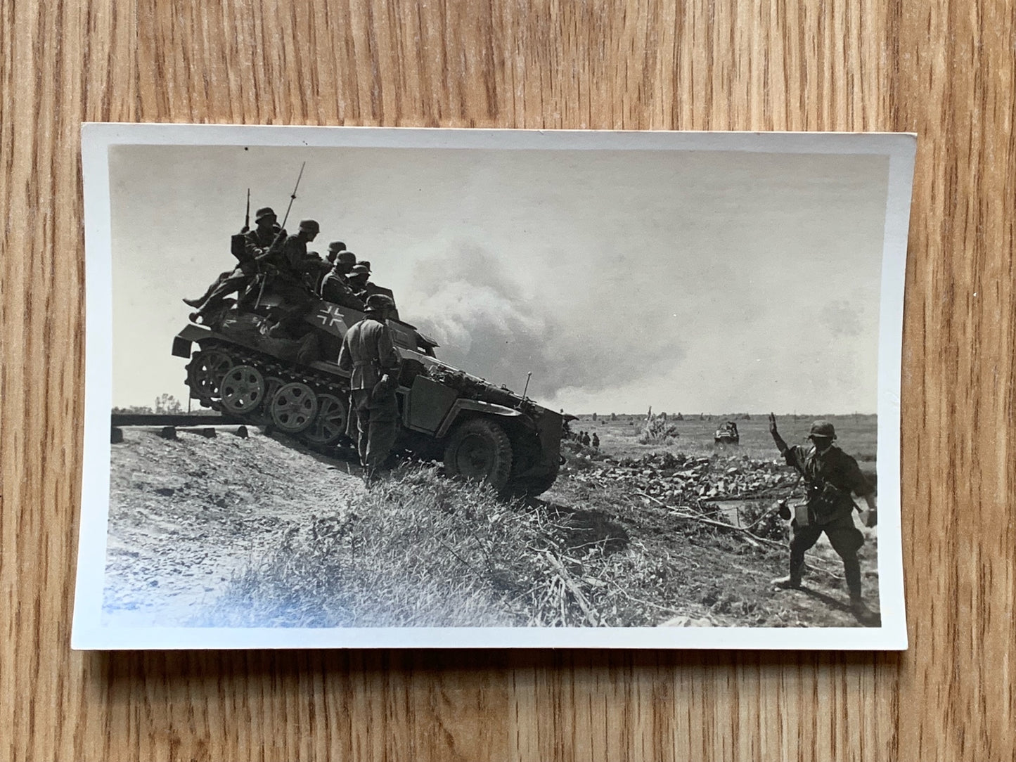 Panzergrenadiers traversing terrain - photo postcard