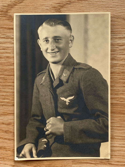 Luftwaffe photo postcard - Soldier with Luftwaffe ring